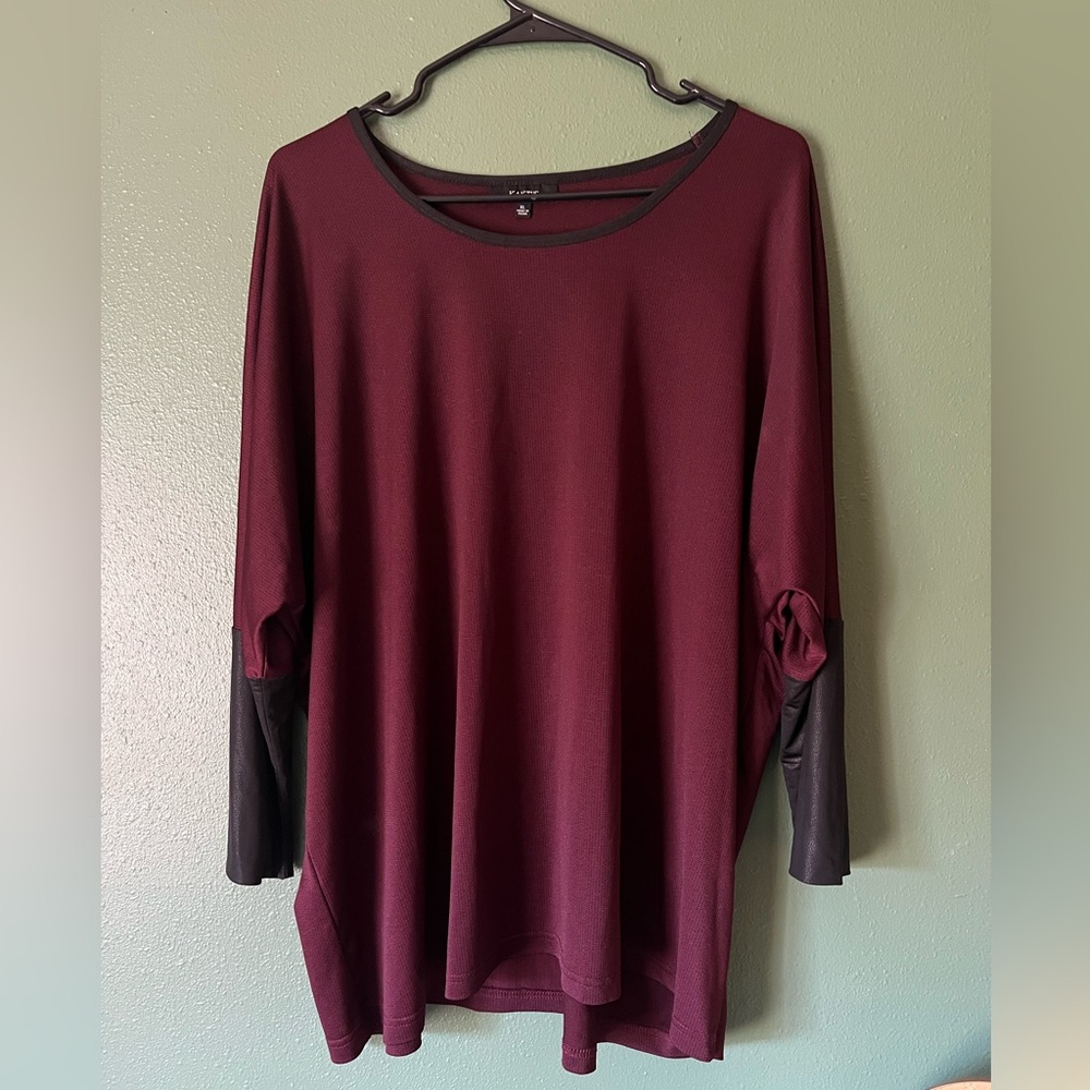 Maroon top with black sleeves